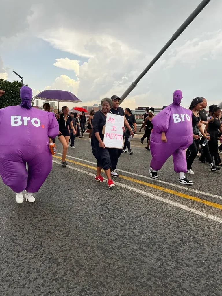 March across the Nelson Mandela Bridge with Bro mascots and community members